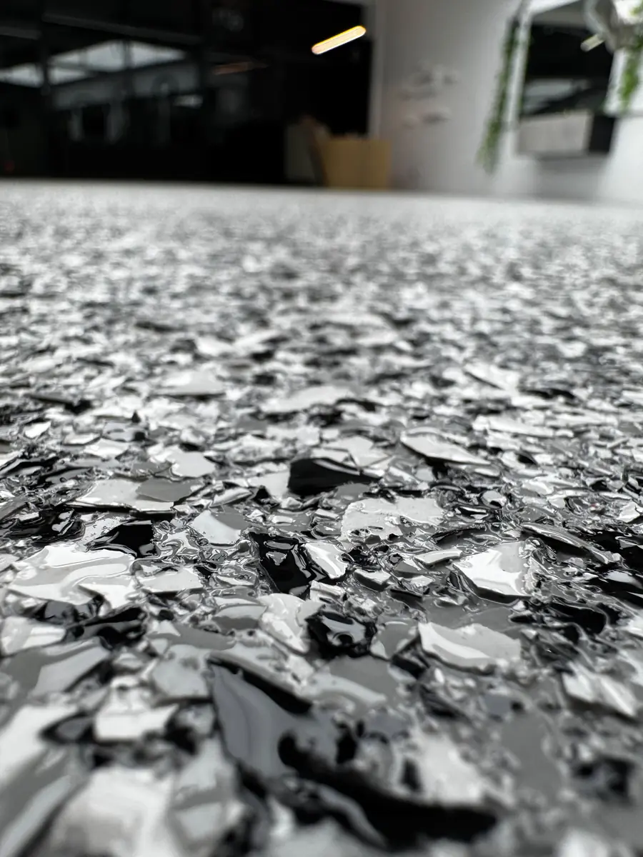Full-broadcast flake garage floor, Basalt over Pipeline Grey